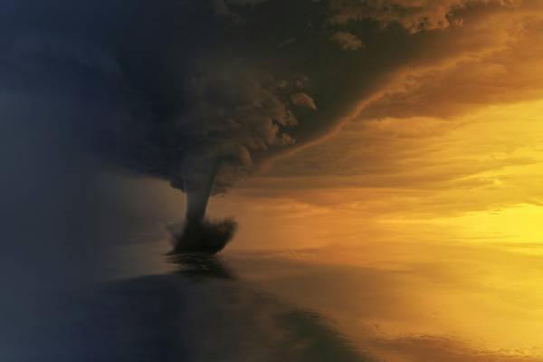 photo of waterspout over ocean
